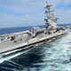 Illustration for article titled Watch This Super Carrier Carve Through The Sea During High-Speed Turn Trials